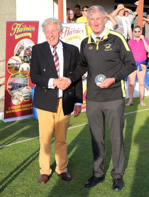Malcolm Thomas receives his memento